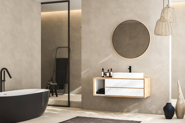 istock Modern minimalist bathroom interior, modern bathroom cabinet, white sink, wooden vanity, interior plants, bathroom accessories, bathtub and shower, beige walls, granite floor, vases. 3d rendering 1468469941