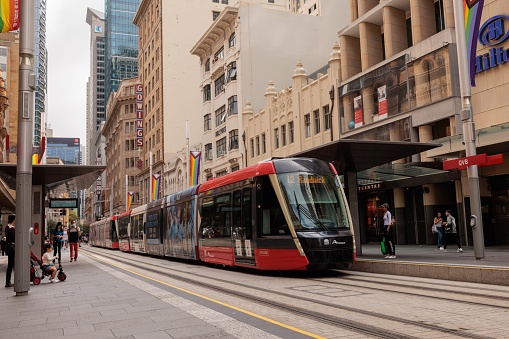 Sydney, Australia - February 19,  2023: A lightrail car at a stop on George Street, Sydney