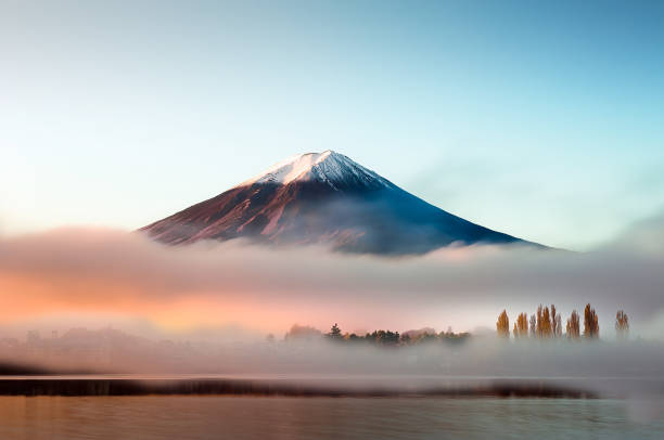 Mt Fuji Mt Fuji in the early morning with reflection on the lake kawaguchiko honshu stock pictures, royalty-free photos & images