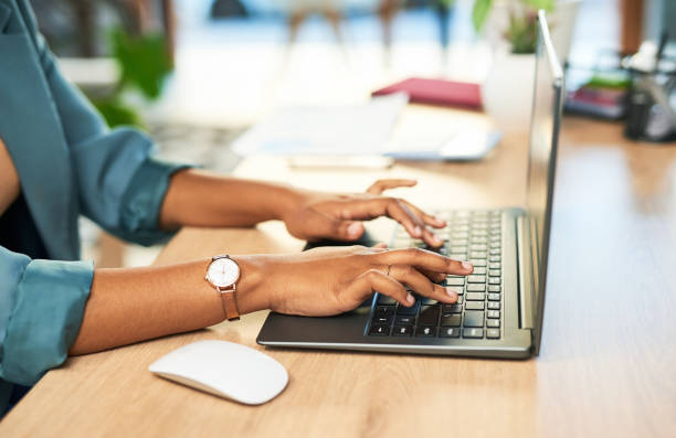 istock Hands, black woman and laptop keyboard in office for planning, data analysis and internet. Closeup, typing and desktop technology of worker for seo research, website networking or business management 1468479562