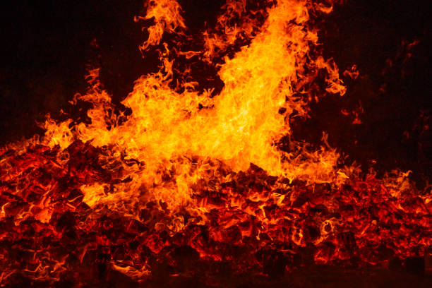 istock Fire by night. Flames and embers. Hot and inferno 1468479883