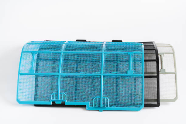 istock Household air conditioner filters. Replacement and cleaning concept. 1468480402