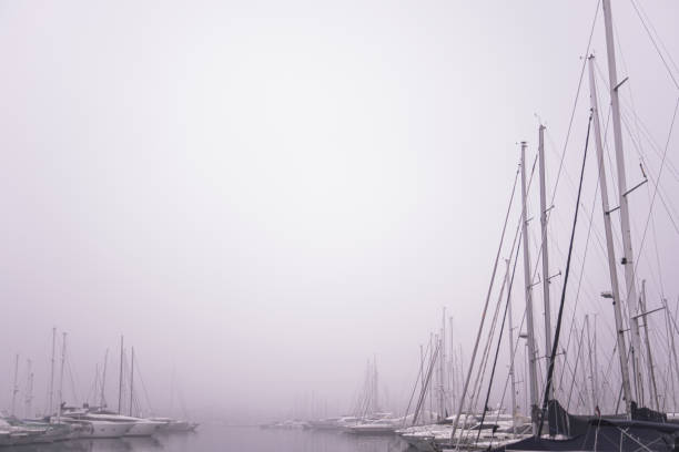 Taking a walk down the old town's harbor with all the boats parked and waiting for sunny days