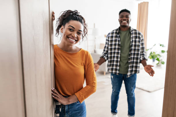 istock African Spouses Meeting You Standing In Opened Doors At Home 1468483344