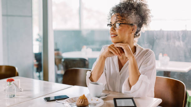 istock Successful businesswoman looking away thoughtfully 1468487040