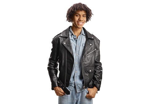 Young african american man with dreadlocks wearing a leather jacket isolated on white background
