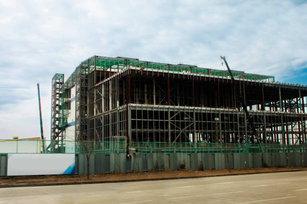istock Asian labor people and korean labour workers use machine and heavy machinery working builder new structure tower building on scaffold at construction site in Pohang or North Gyeongsang, South Korea 1468495207