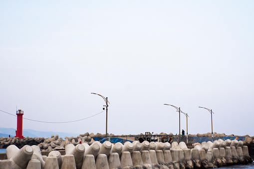 Concrete block tetrapod for breakwater and wave water dissipating prevent erosion at fishery fishing jetty in east japan sea and ocean in Pohang city of Gyeongsangbuk or North Gyeongsang, South Korea