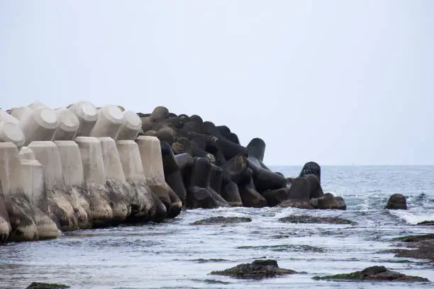 Concrete block tetrapod for breakwater and wave water dissipating prevent erosion at fishery fishing jetty in east japan sea and ocean in Pohang city of Gyeongsangbuk or North Gyeongsang, South Korea