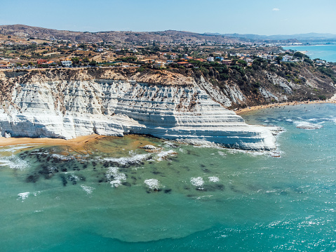 Aerial view of Scala dei Turchi, a famous landmark in Sicily, Italy. Scala dei Turchi is a famous rocky cliff in Realmonte, near Agrigento and Porto Empedocle. The cliff has a bright white color.