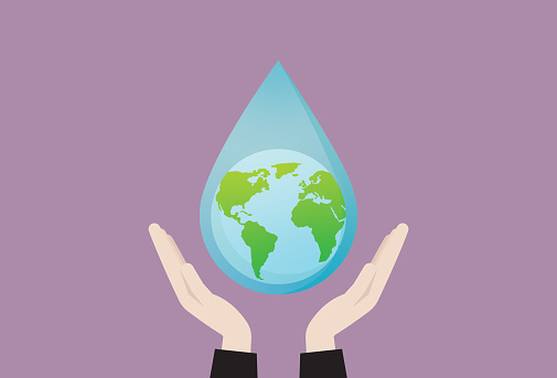 Hand holding a water drop for world water day