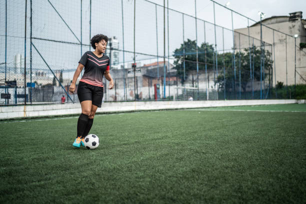 istock Female soccer player during a match 1468508293