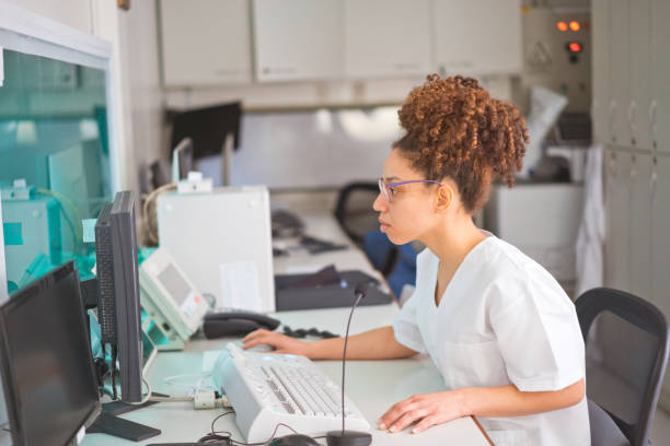 istock Female medical expert using computer in medical clinic 1468509168