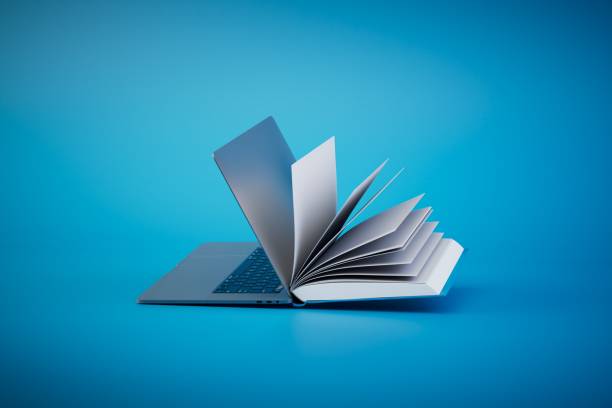 istock reading books online. Open book and laptop on a blue background. 3D render 1468510805