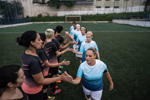 istock Female soccer players shaking hands before the match 1468511655
