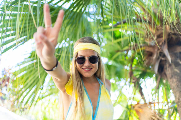 istock Portrait of a beauty model gesturing peace with the hands 1468512160