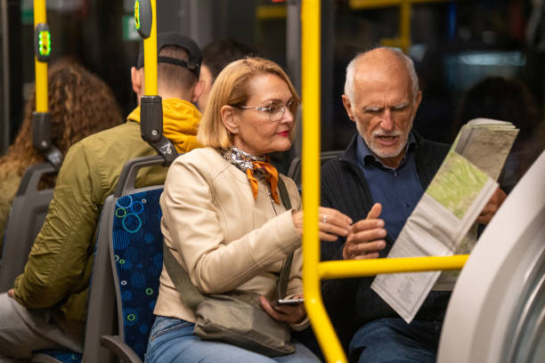 istock Couple sitting in bus 1468513620