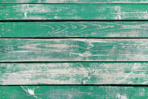 istock Green weathered aged wooden background 1468514345