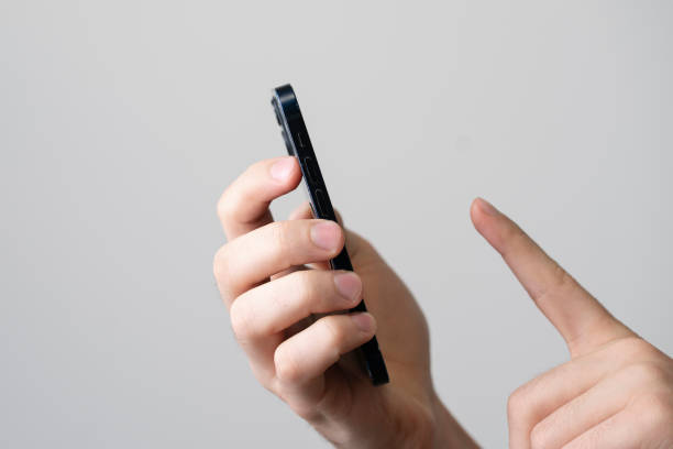 istock person using finger scan to unlock his smartphone 1468514517