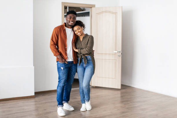 istock Loving Black Spouses Embracing Posing In New Home 1468516904