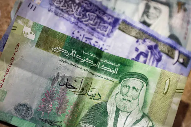 Group of Jordanian Dinar banknotes, perfect for backgrounds.