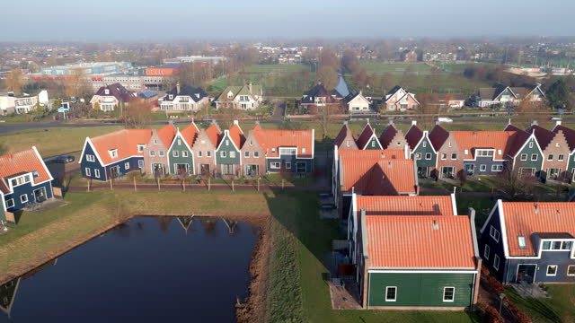 Volendam - small historical Dutch village. Drone shot, rising vertical.