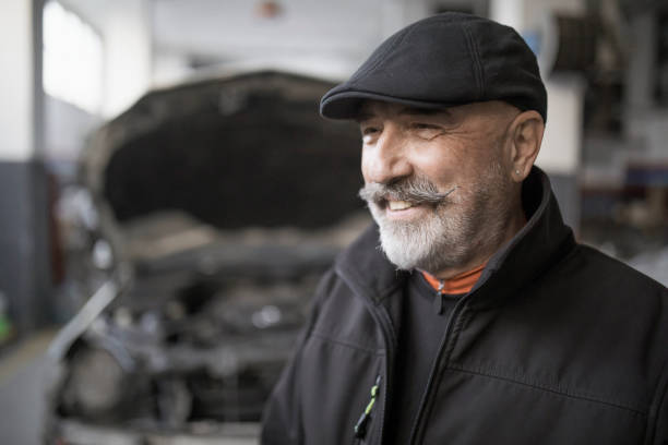 istock Real 70 years worker senior man portrait 1468519099