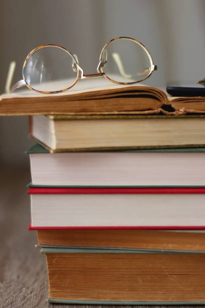 istock Books, Tablet, Glasses and Pen 1468520354