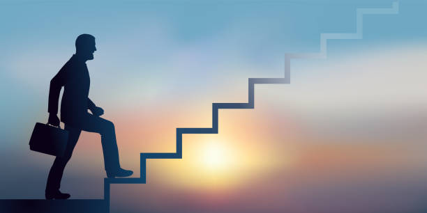 istock Symbol of success with a businessman climbing the hierarchy. 1468522555