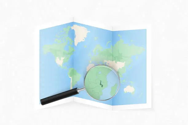 Vector illustration of Enlarge Malawi with a magnifying glass on a folded map of the world.