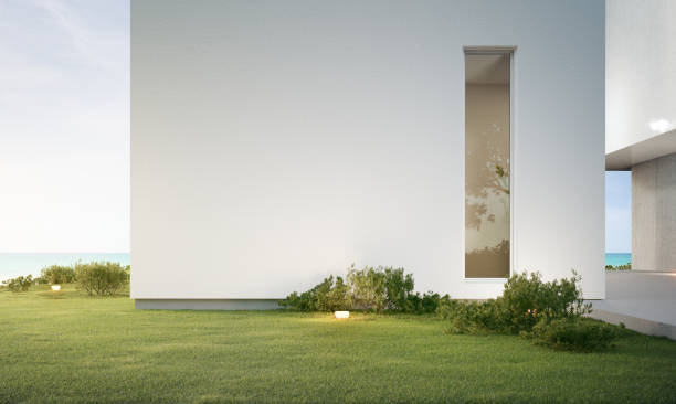 istock House with concrete terrace near empty grass floor. 1468528066