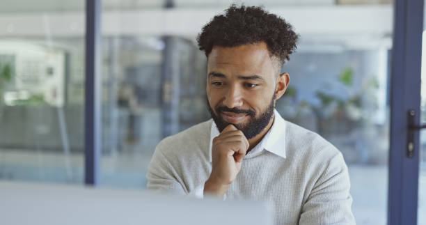 istock Thinking, planning and business man or employee with an idea in the office working for a mission or goal in consideration. Worker, entrepreneur and professional at a startup company in development 1468529162