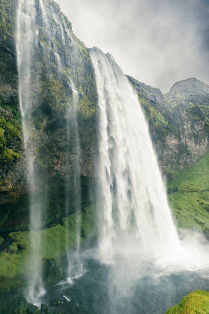 istock Seljalandsfoss Waterfall in Iceland on a cloudy and stormy day. 1468529349