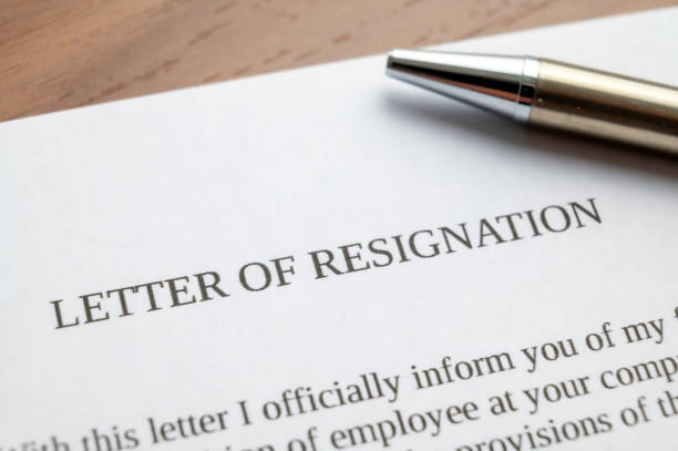 istock Letter of resignation, and pen beside it. 1468534604