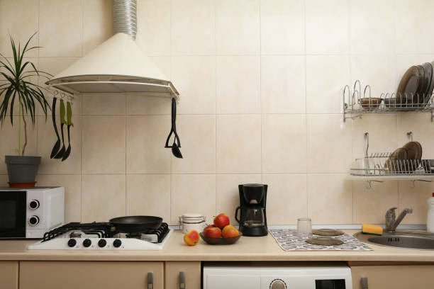 istock Stylish kitchen interior with different modern appliances and apples 1468543887