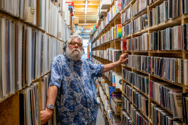 istock Record collector, in front of his music collection 1468552005