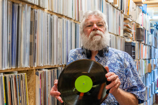 istock Record collector, in front of his music collection 1468552209