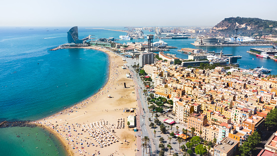 Aerial view made with a drone of la Barceloneta beach and residential district, situated in Barcelona - Spain