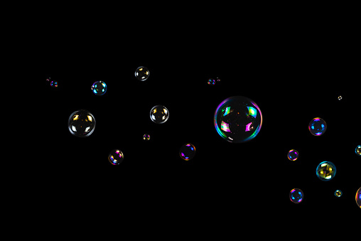 photographed floating soap bubbles isolated on pure white. clipping path included.