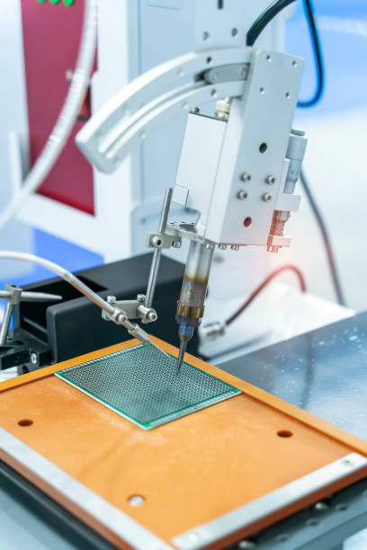 istock automatic robot for print circuit board (PCB)assembly machine during soldering or welding part 1468559009