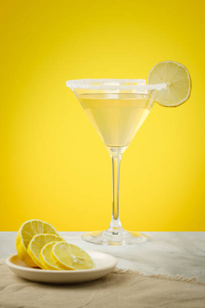 istock Lemon drop martini coktail garnished with lemon. Martini alcoholic cocktail or non-alcoholic mocktail. Martinis. 1468559444
