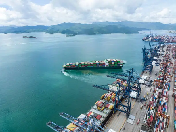 Photo of Aerial view of Manufacturing logistics cargo container ship at ship port in Yantian port, shenzhen city, China.export import business logistic international.