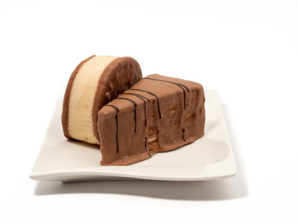 istock Piece of chocolate cake isolated on white background. 1468560153