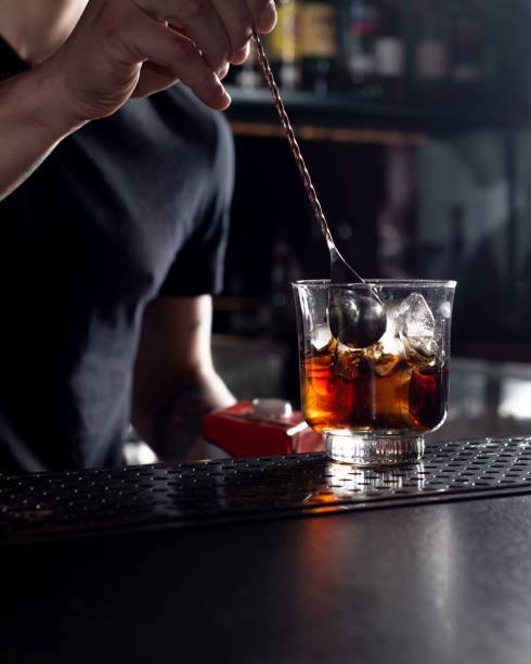 istock Bartender is preparing a cocktail at the bar. 1468564146