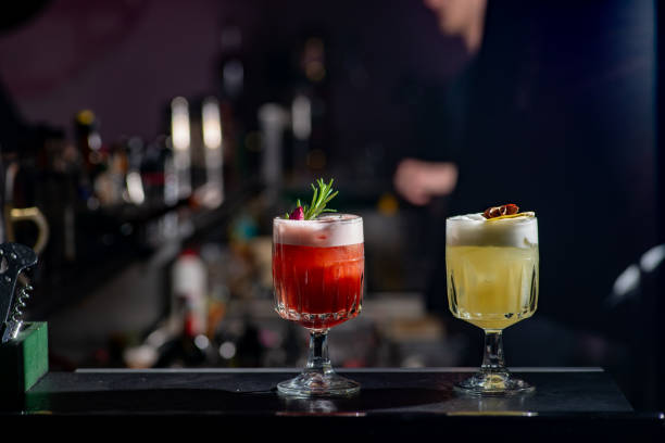 istock Two cocktails red and yellow on the bar. 1468564148