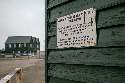 Byelaws Sign at Whitstable Harbour in Kent, England