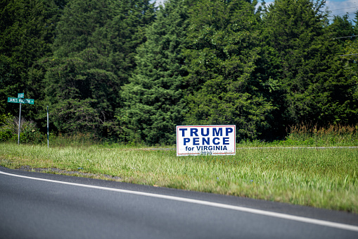 Remington, USA - August 30, 2020: Presidential election political support sign poster for Donald Trump and Mike Pence for Virginia in rural countryside farm