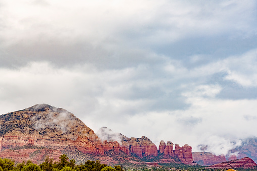 This is a photograph of an overcast sky above the scenic landscape in Sedona, Arizona in spring time.