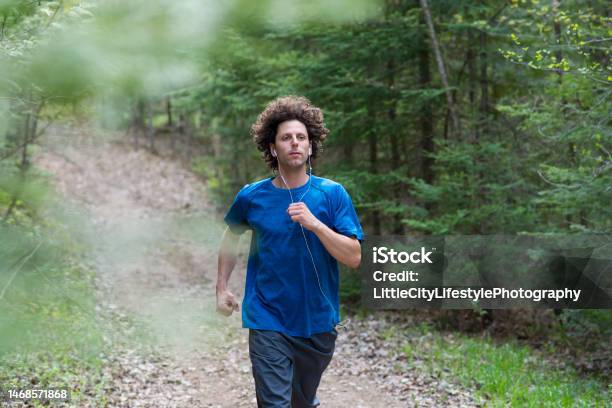 Running Frantically In Forest Man Running In The Forest Stock Photo - Download Image Now - 30-34 ...