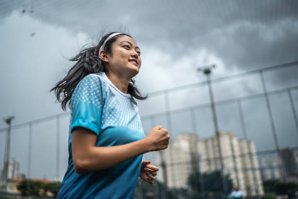 istock Female soccer player doing warm up exercise 1468573759
